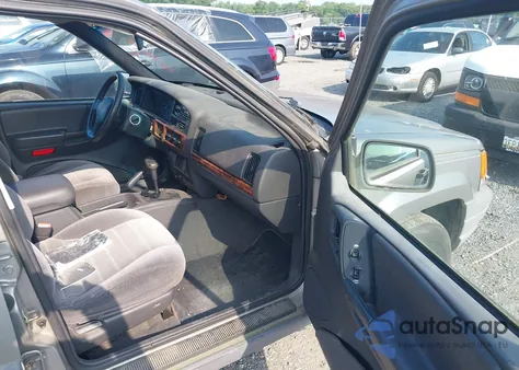 1997 Jeep Grand Cherokee Laredo/Tsi из США, поврежденный, VIN 1J4GZ58S9VC742825